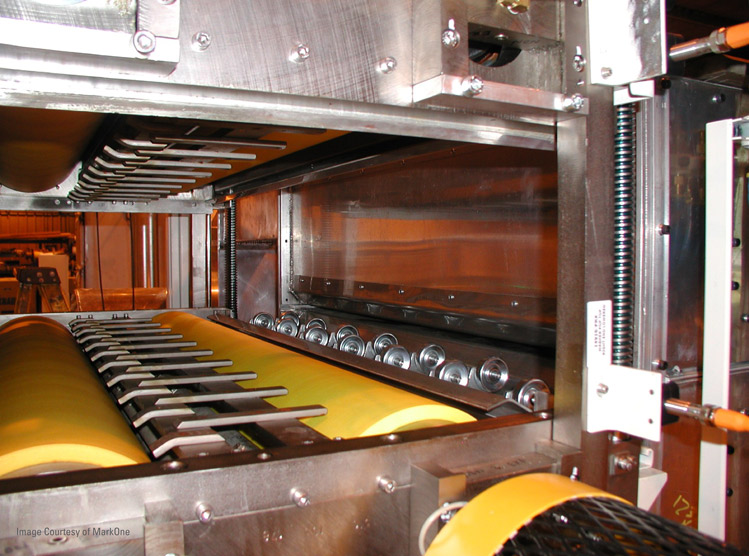Four NCCM<sup>®</sup> Premier Yellow rolls in a MarkOne blank washer