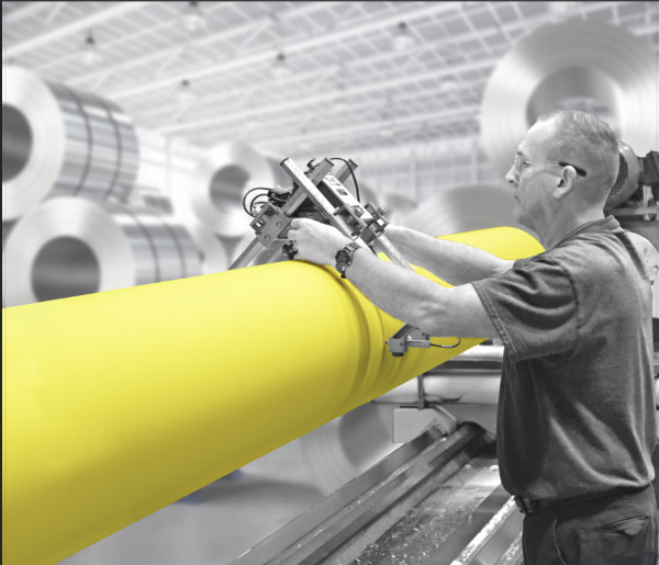 A pair of NCCM<sup>®</sup> Premier Yellow nonwoven rolls wringing fluid from a metal strip.