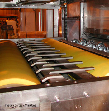 Two NCCM<sup>®</sup> Premier Yellow rolls in a MarkOne blank washer